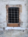 Lattice on the window in an old ruined house Royalty Free Stock Photo