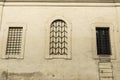 Lattice windows of an old classic building in Rome, Italy Royalty Free Stock Photo