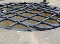 Latticed water well iron cover