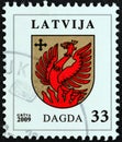 LATVIA - CIRCA 2009: A stamp printed in Latvia from the `Coat of Arms` issue shows Dagda coat of arms, circa 2009.