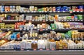 Shelves with a variety of cheeses from different manufacturers