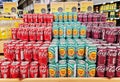 Soda pop drinks on shelves for sale in big food section. Royalty Free Stock Photo