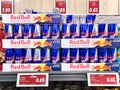 Aluminium cans of Red Bull Energy drink on the shelves of Lidl supermarket in Riga.