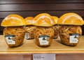 Glass jars in the shape of mushrooms with pickled funghi funghi pioppini in supermarker shelves Royalty Free Stock Photo