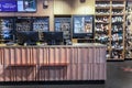 Interior of modern wine boutique store with vintage style wooden showcases
