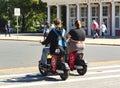 Movement of tourists on city electric bike in Riga Old Town, Latvia.