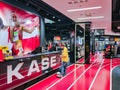 Teenager buying a basketball in a Sportland sporting goods retailer