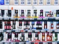 Various wines in sales boxes with promotional discounts on the shelves of the Lidl supermarket, Riga. Royalty Free Stock Photo