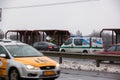 Latvia, Riga - December 1.2017: Municipal police of Riga, Latvia at the place of accident by the car. Smoking electronic cigartes