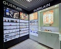 Modern interior of premium perfume Guerlain boutique in Stockmann shopping mall, Riga Royalty Free Stock Photo