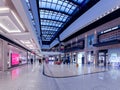 Panorama of modern multi-storey shopping center Akropole with glass ceiling in Riga