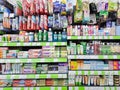 A large selection of tooth pastes, tooth rinse and other hygiene items on shelves