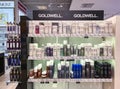 Shelves with popular professional cosmetics Goldwell in the shopping mall