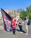 Journalist correspondent takes interview with fans of Ice Hockey World Championship 2023 in Riga Old Town