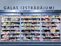 Large refrigerators with vacuum-packed ham, salami and smoked meats