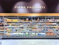 Modern refrigeration equipment in large department of dairy products in the Elkor supermarket