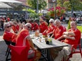 Tourists and fans of the World Basketball Championship 2023 drink beer on the open veranda of cafes Royalty Free Stock Photo