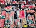 Vacuum-packed ham, salami and smoked meats in the deli section of a Elkor supermarket