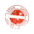 Latvia sign, vintage grunge imprint with flag on white Royalty Free Stock Photo