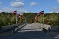 Latvia, sigulda. Decorated bridge with Latvian flags on a national holiday