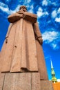 Latvian Riflemen Monument, a controversial red granite statue originally dedicated to the Latvian Red Riflemen