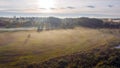 Latvian rural landscape on a foggy autumn morning