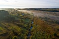 Latvian rural landscape on a foggy autumn morning