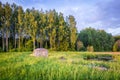 Latvian rural landscape with greenhouse