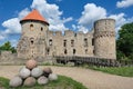 Latvian tourist landmark attraction - ruins of the medieval castle, stone walls and towers in Cesis town, Latvia Royalty Free Stock Photo