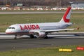 Lauda Airline Airbus A320 passenger plane taxiing at Dusseldorf Airport. Germany - February 7, 2020