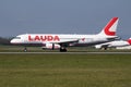 Laudamotion Airbus A320 OE-LOB passenger plane arrival and landing at Vienna International Airport