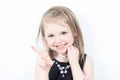 Laugh a little girl at the studio shooting Royalty Free Stock Photo
