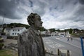 Laugharne, Wales, UK, July 2014, view of Dylan Thomas carved statue Royalty Free Stock Photo