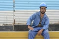 Laughing Afghanistanian construction workman at building site