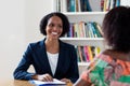 Laughing african american businesswoman at job interview Royalty Free Stock Photo