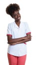 Laughing african american female pharmacist Royalty Free Stock Photo