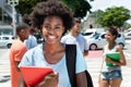 Laughing african american female student with group of friends Royalty Free Stock Photo