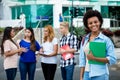 Laughing african american female student with group of international people Royalty Free Stock Photo