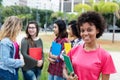 Laughing african american female student with group of international students Royalty Free Stock Photo