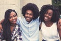 Laughing african american hipster man with two beautiful woman Royalty Free Stock Photo