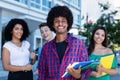 Laughing african american hipster student with group of international students Royalty Free Stock Photo