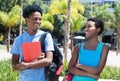 Laughing african american male and female student on campus of u Royalty Free Stock Photo