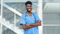 Laughing african american male nurse or medical student with beard Royalty Free Stock Photo