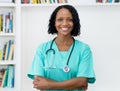 Laughing african american mature nurse