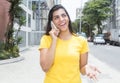 Laughing african american student with paperwork Royalty Free Stock Photo