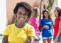 Laughing african american woman with three girlfriends in the city Royalty Free Stock Photo