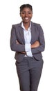 Laughing african businesswoman with crossed arms Royalty Free Stock Photo