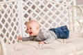 Laughing Baby Boy Lying On Tummy At Home Royalty Free Stock Photo