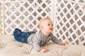 Laughing Baby Boy Lying On Tummy At Home Royalty Free Stock Photo