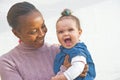 Laughing baby with Mother. Royalty Free Stock Photo